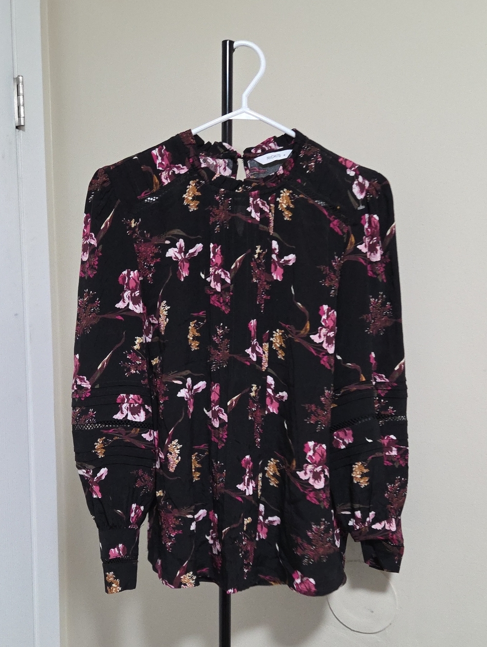 Ricki's Black Floral Tie-Neck Blouse with Pink & Gold Accents